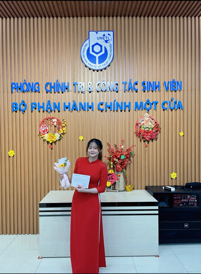 A person in a red dress holding a paper

AI-generated content may be incorrect.