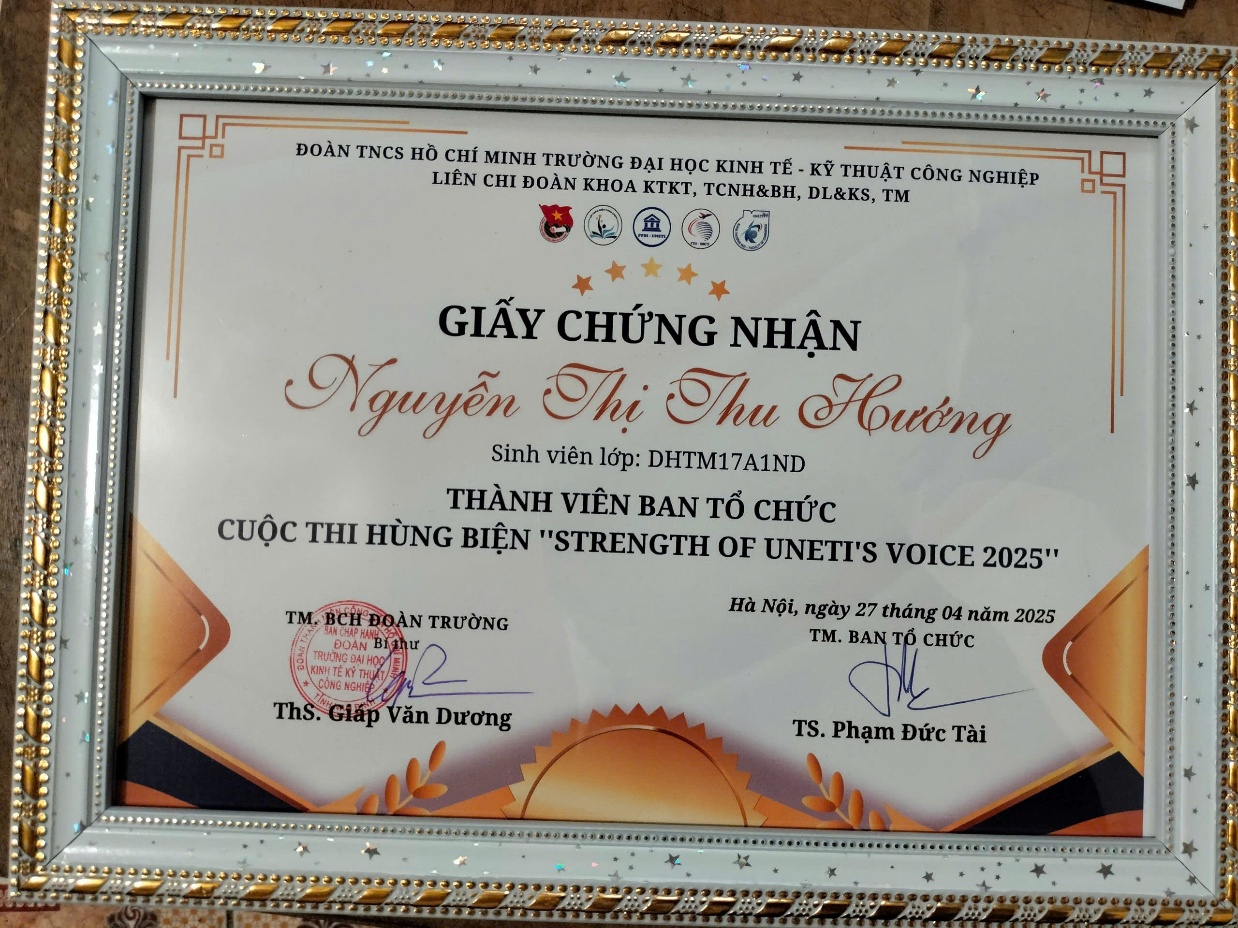 A certificate with a gold border Description automatically generated