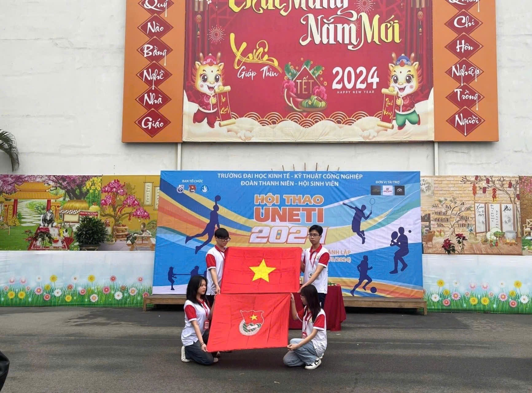 A group of people holding a flag AI-generated content may be incorrect.