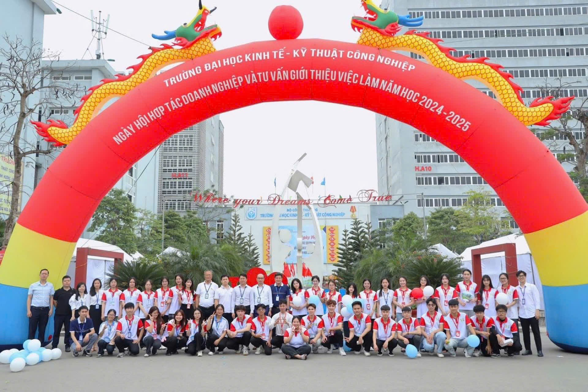 A group of people posing for a photo under a red arch AI-generated content may be incorrect.