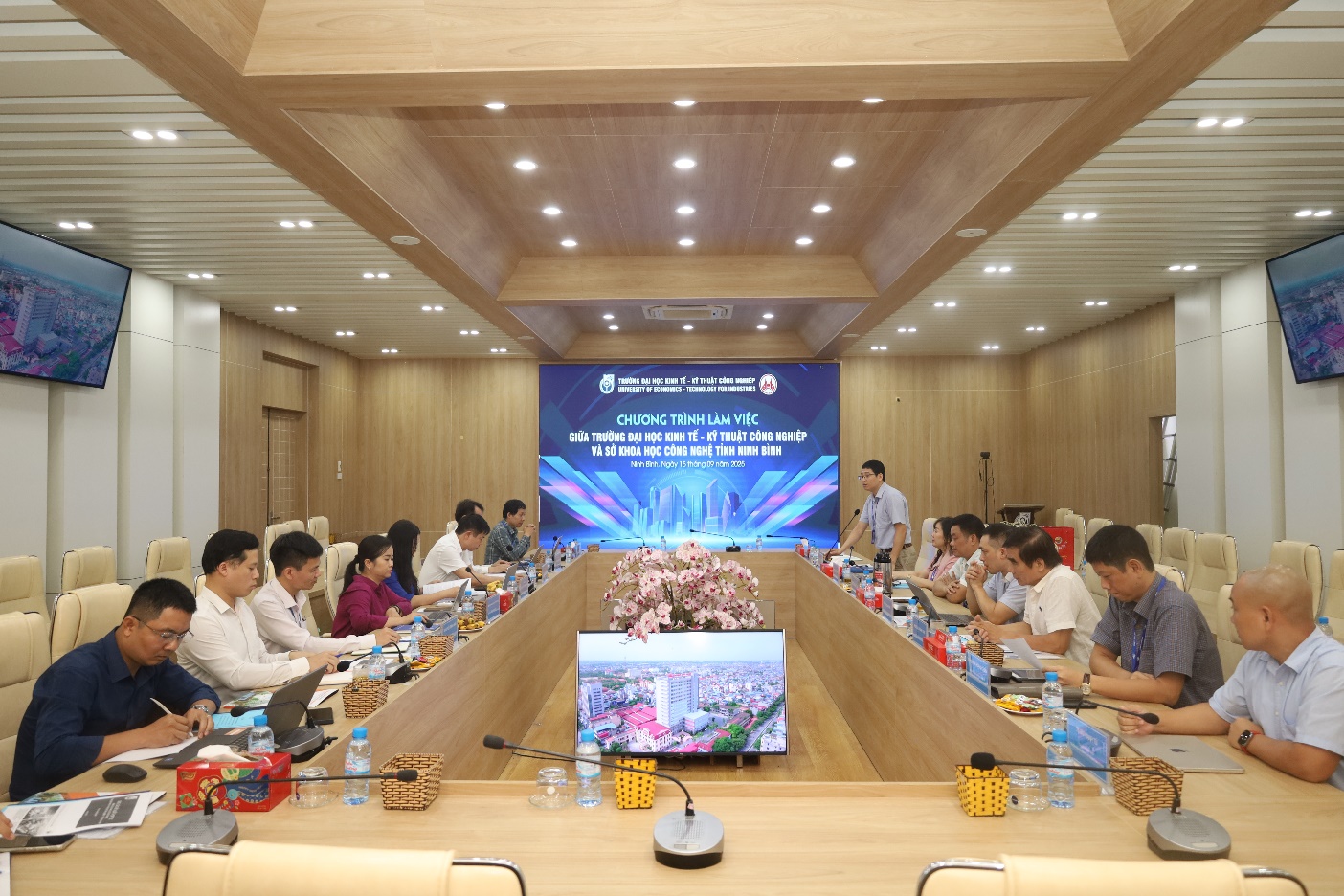 A group of people sitting at a table Description automatically generated