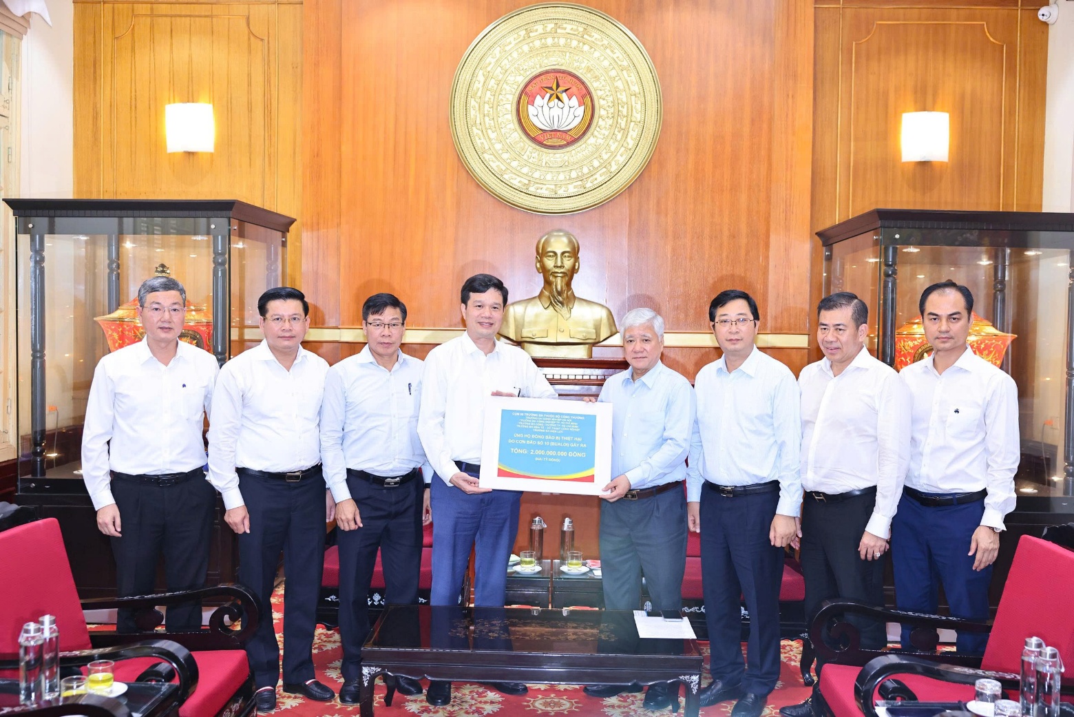 A group of men holding a piece of paper AI-generated content may be incorrect.