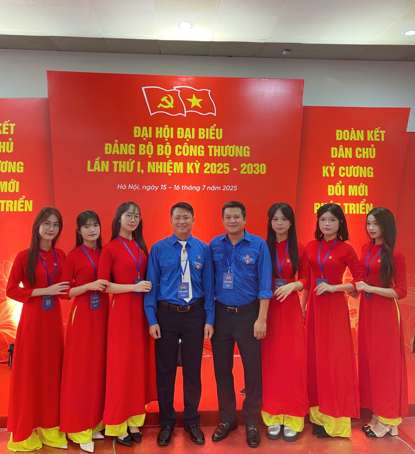 A group of people posing for a photo

AI-generated content may be incorrect.