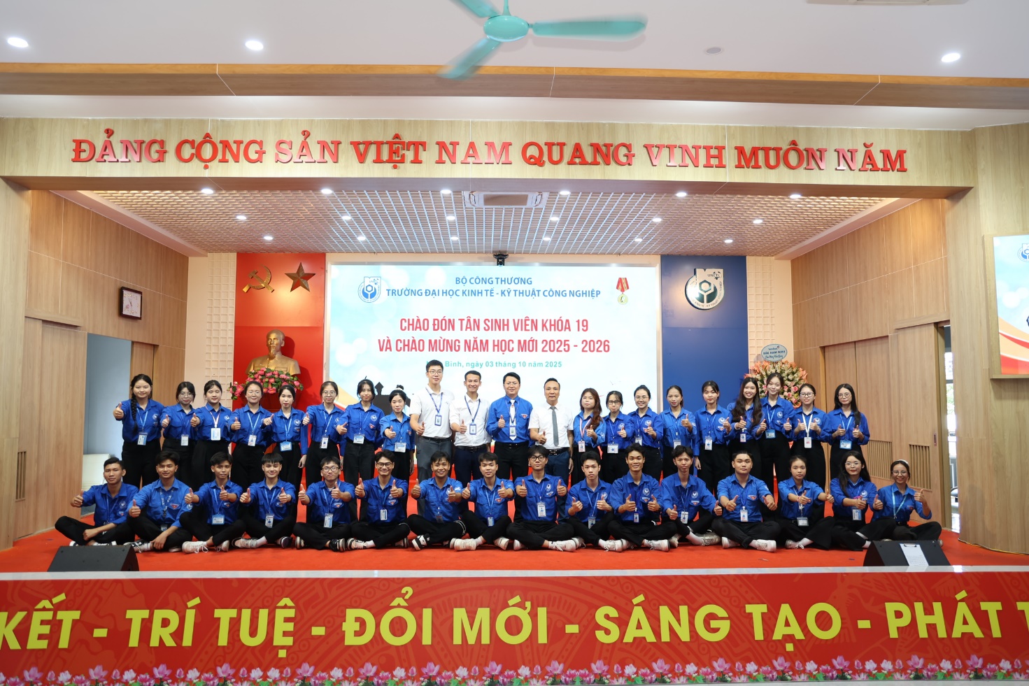 A group of people posing for a photo Description automatically generated