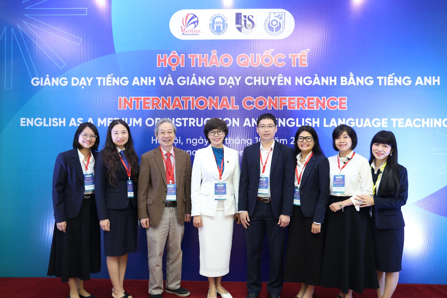 A group of people standing together AI-generated content may be incorrect.