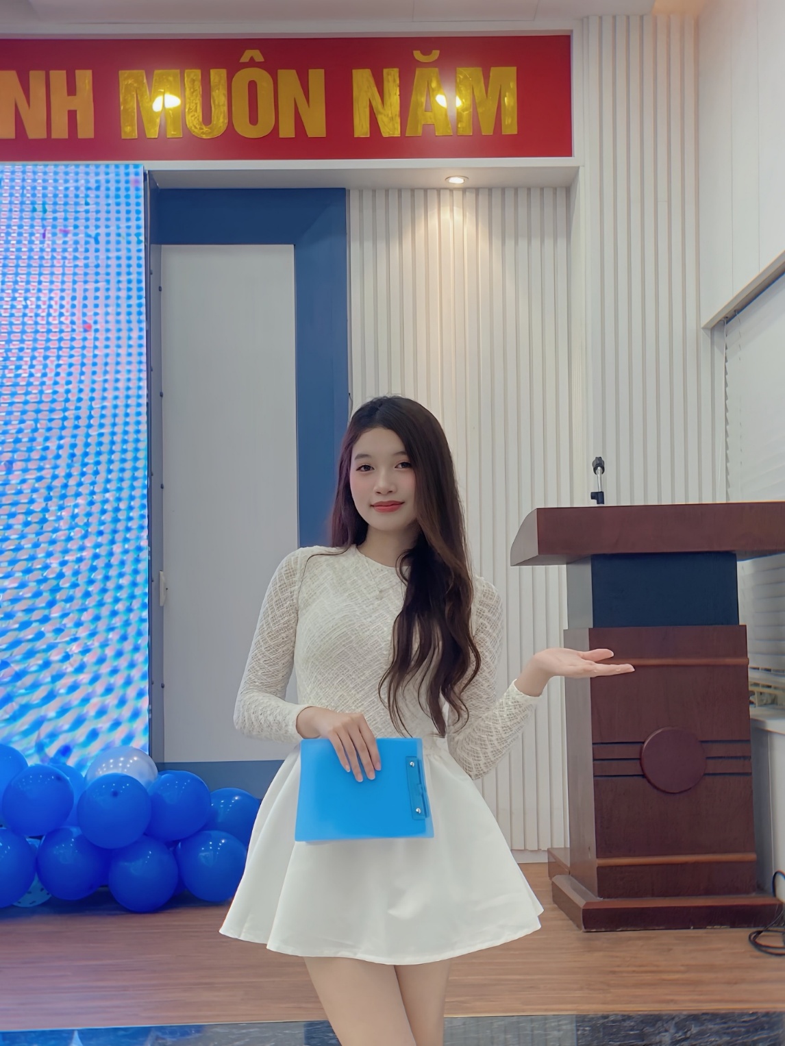 A person in a white dress AI-generated content may be incorrect.