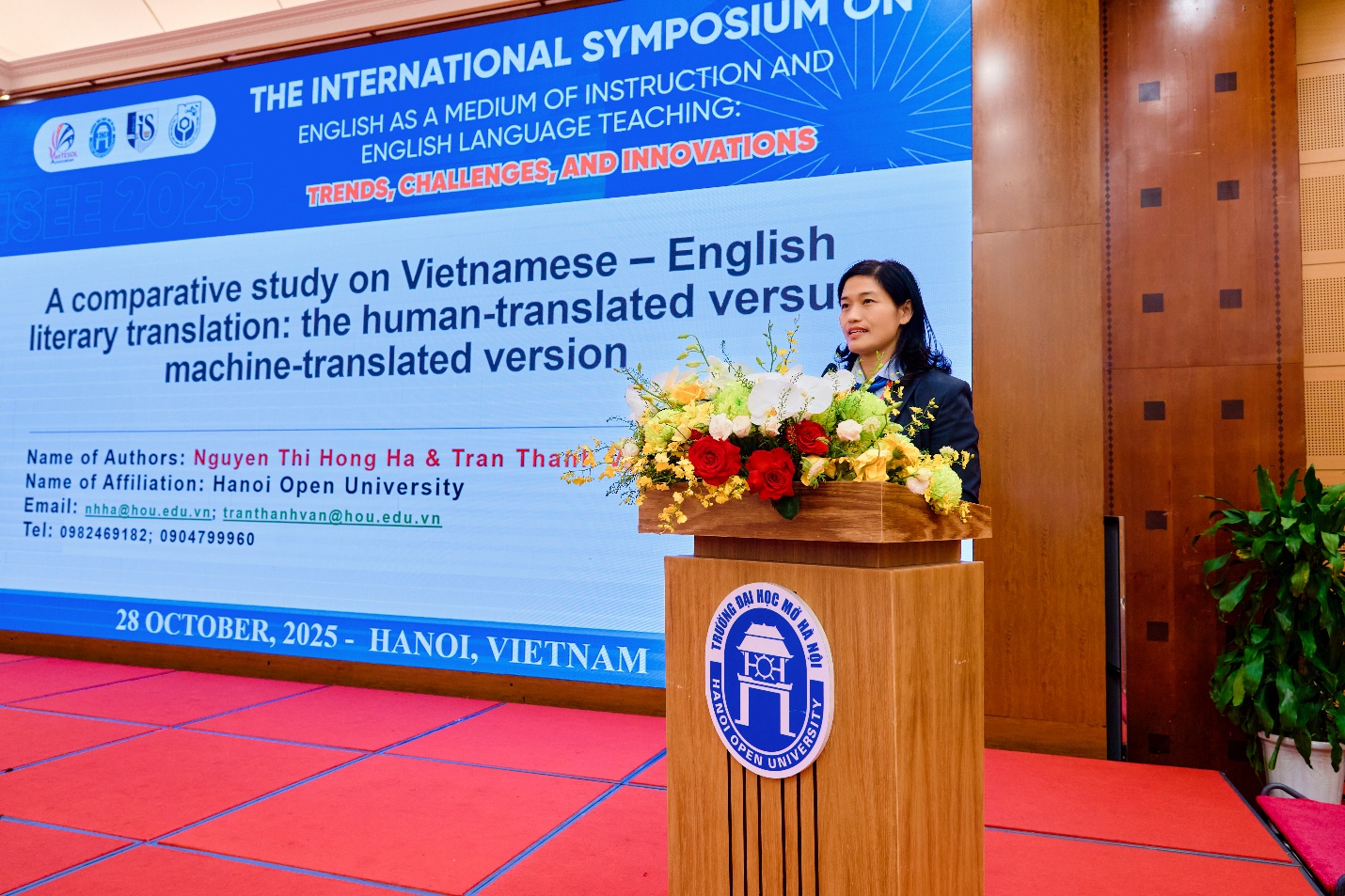 A person standing at a podium with flowers AI-generated content may be incorrect.