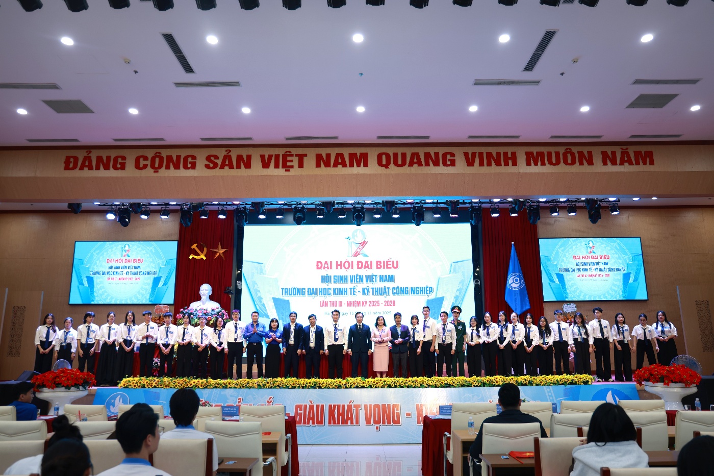 A group of people on a stage Description automatically generated