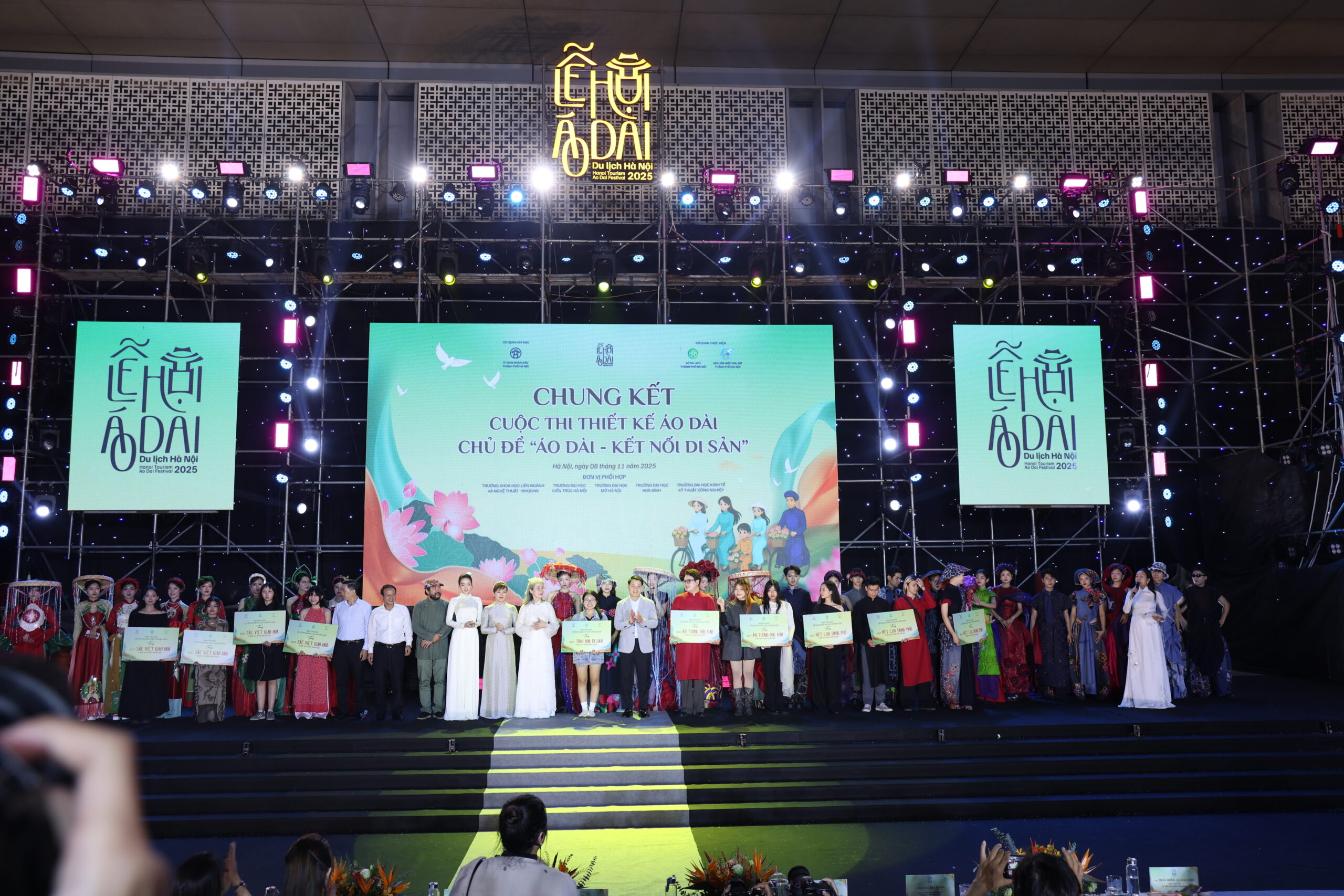 A group of people on stage AI-generated content may be incorrect.