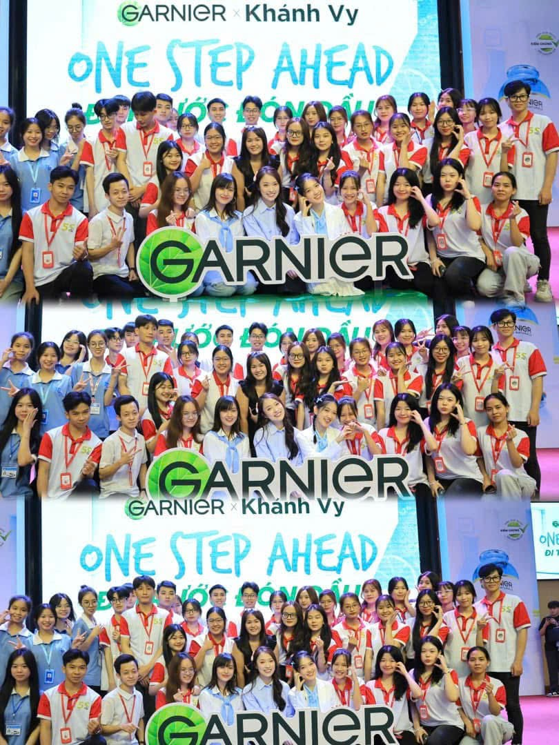 A group of people posing for a photo

Description automatically generated