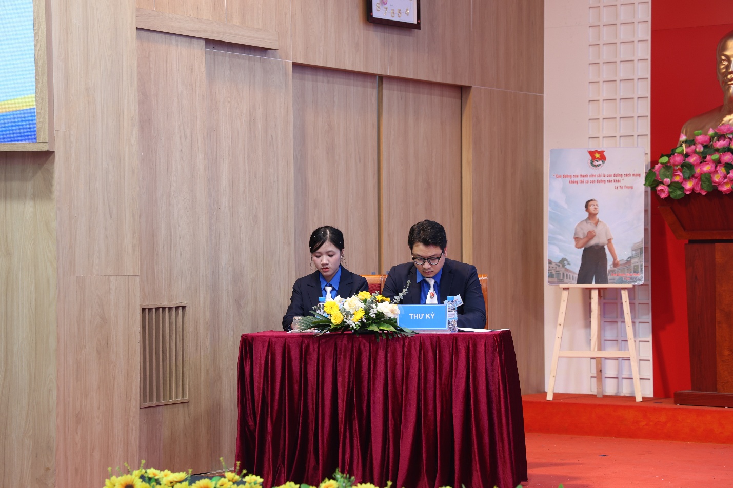 A person and person sitting at a table Description automatically generated