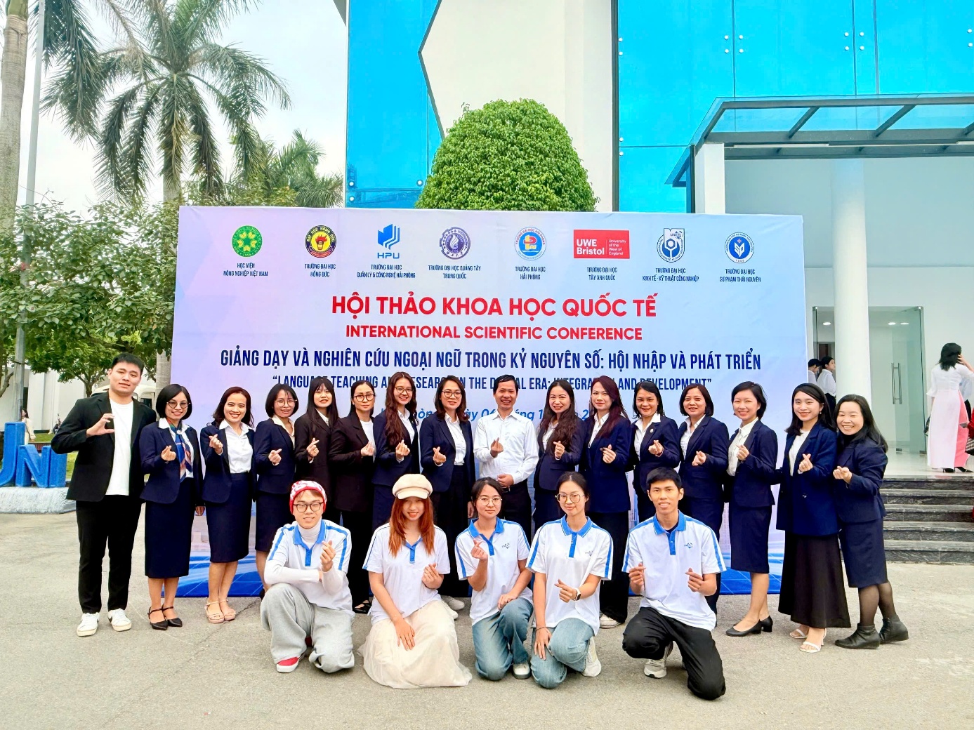 A group of people posing for a photo AI-generated content may be incorrect.