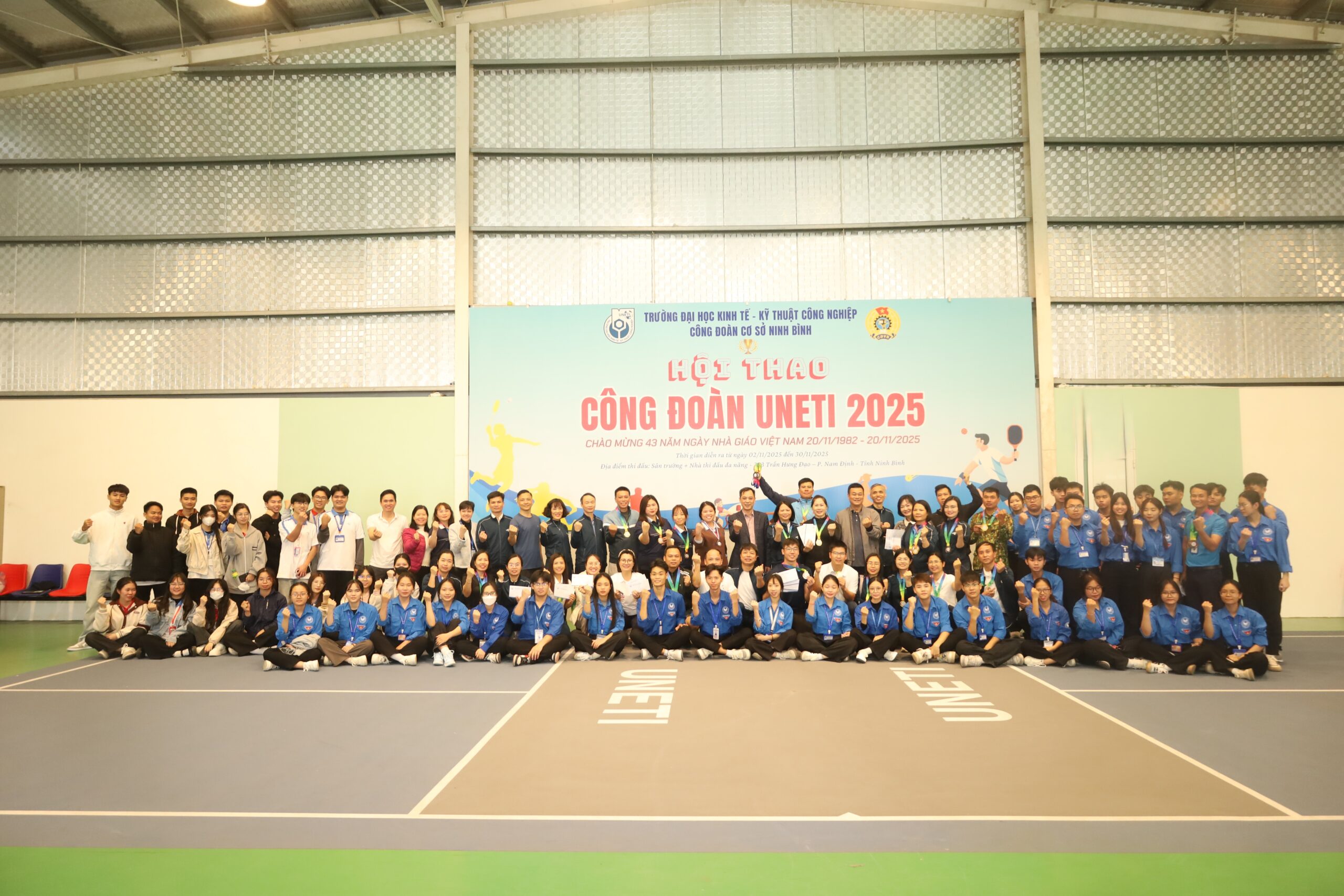 A group of people posing for a photo Description automatically generated