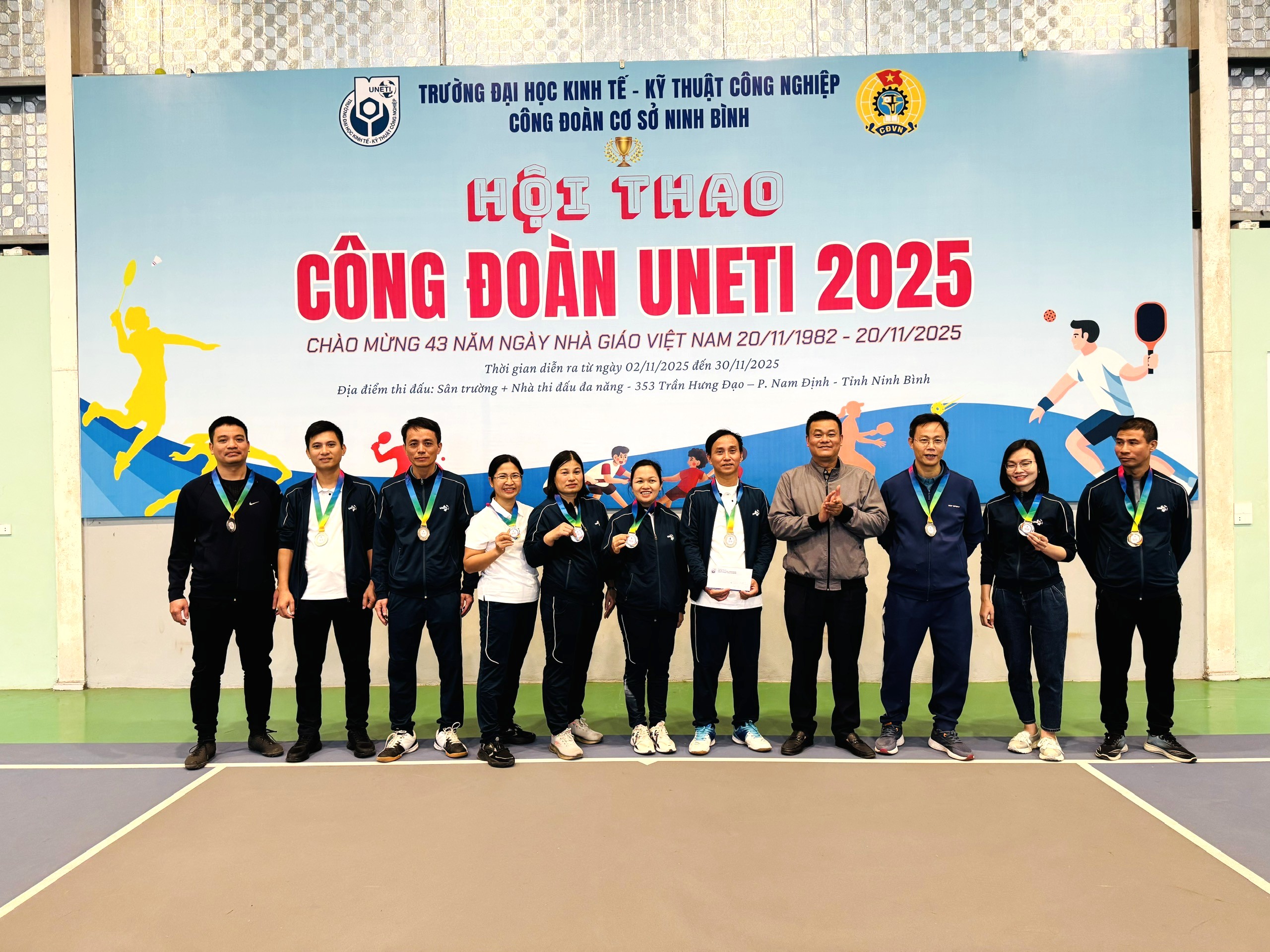 A group of people standing in a line

Description automatically generated