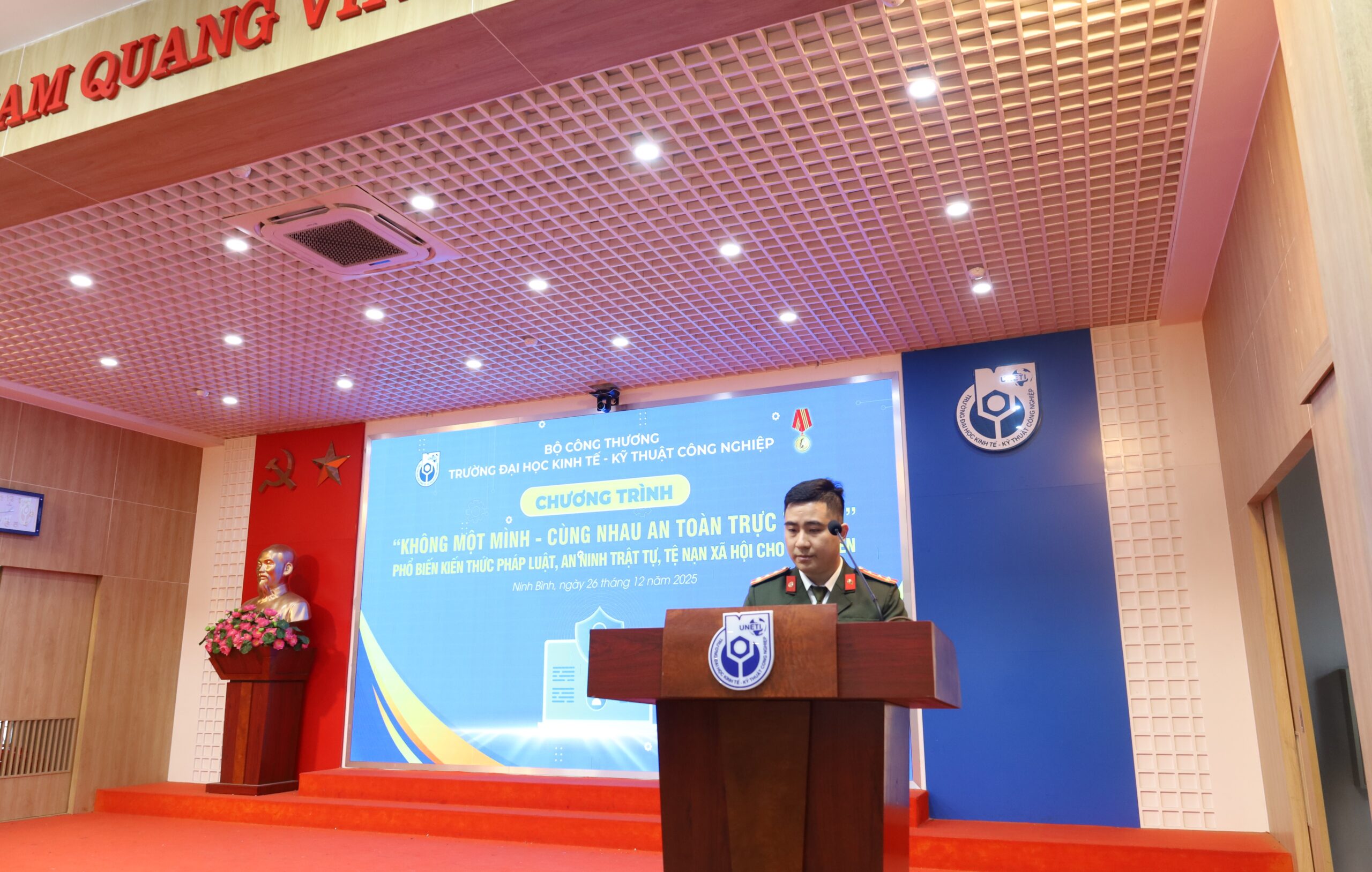 A person in uniform standing at a podium Description automatically generated