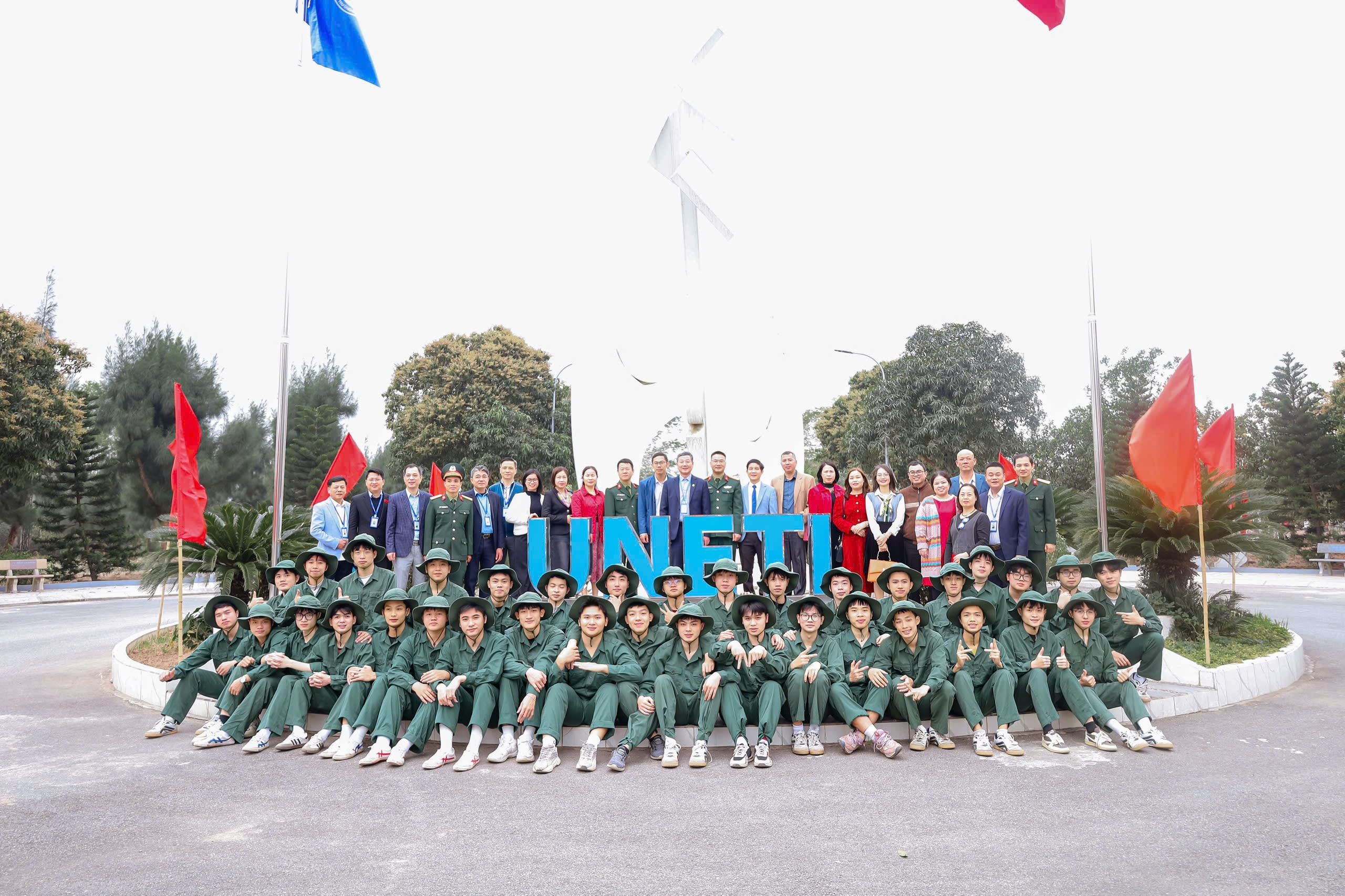 A group of people in uniform posing for a photo Description automatically generated