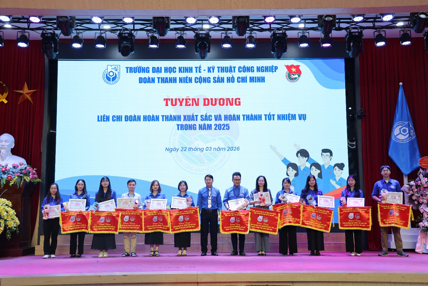 A group of people on a stage Description automatically generated