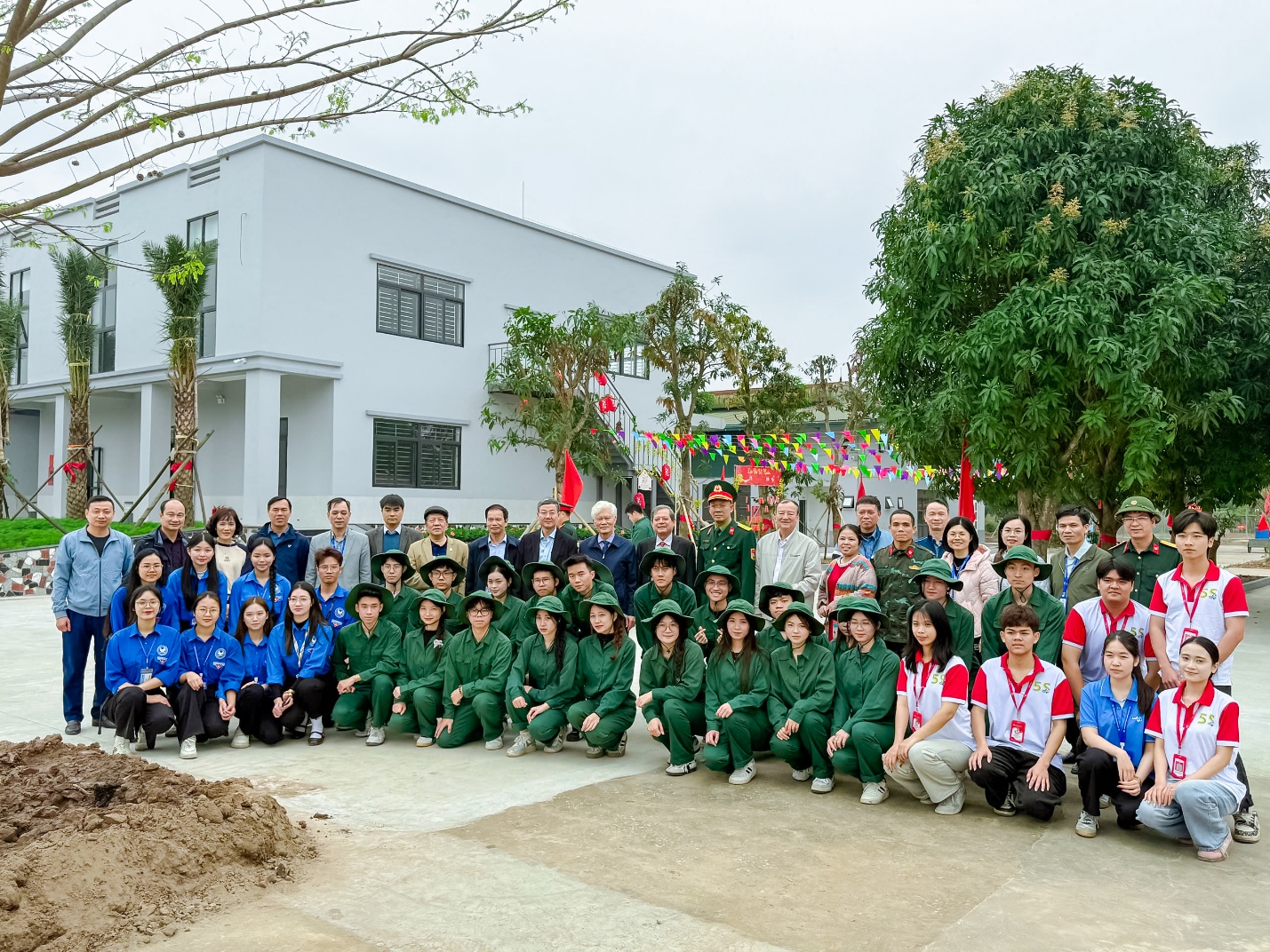A group of people posing for a photo Description automatically generated