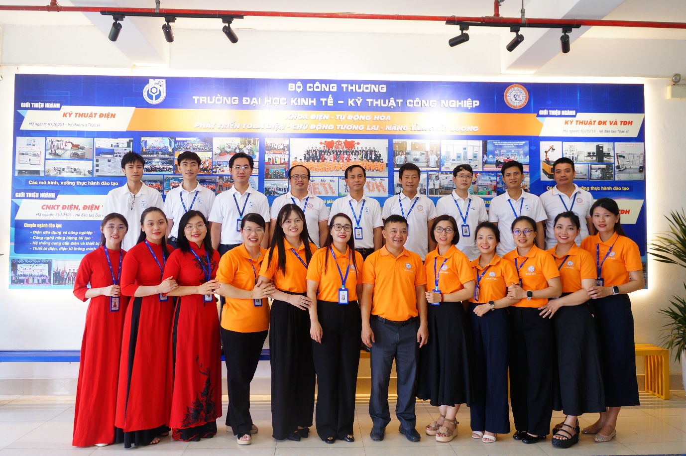 A group of people posing for a photo

Description automatically generated